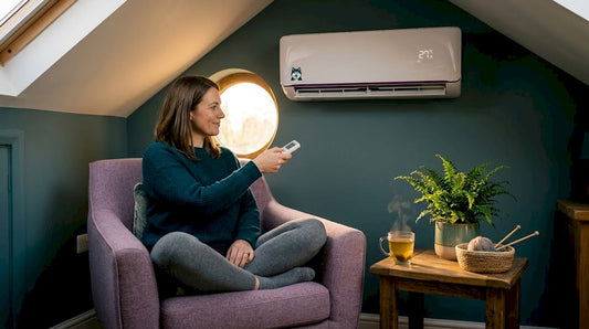 Tenant adjusting air conditioner in living room