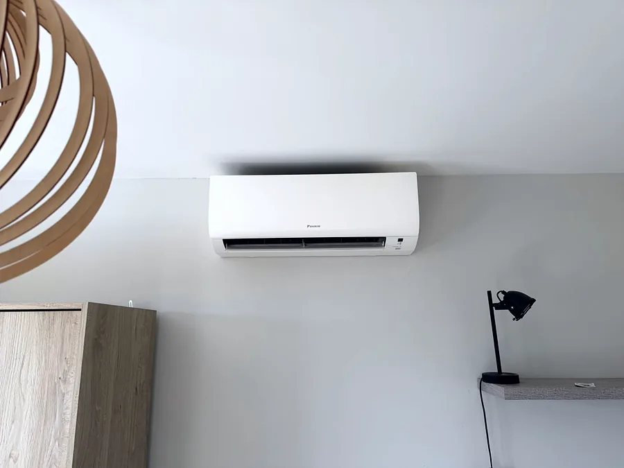 A slim Daikin wall unit we fitted in a calm, minimal room