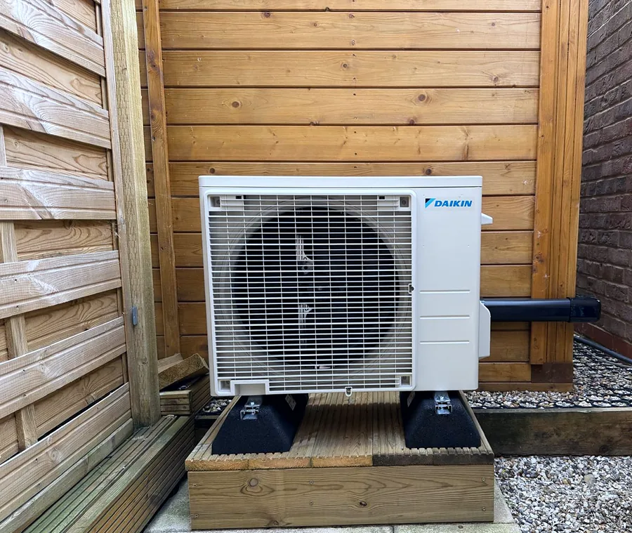 A Daikin outdoor unit we fitted inside a timber enclosure